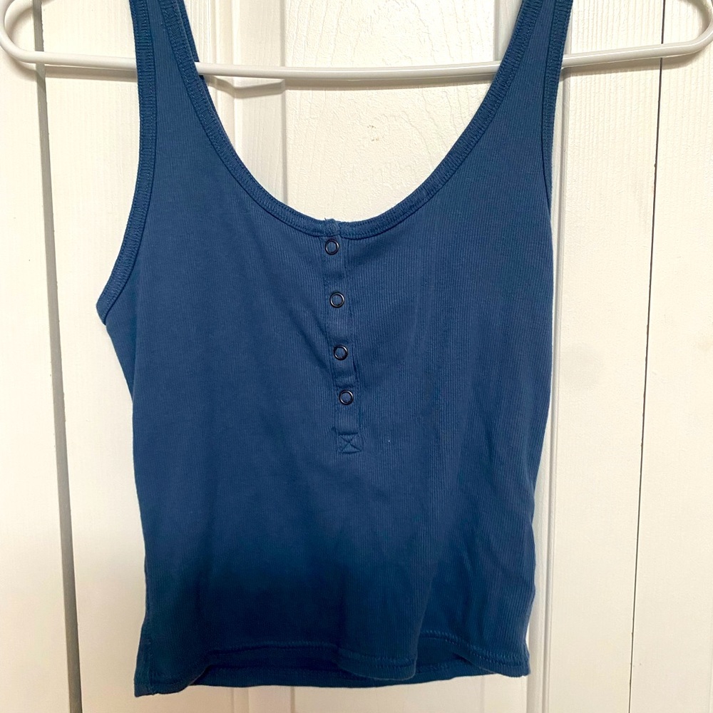 Size small blue half button up tank top :)